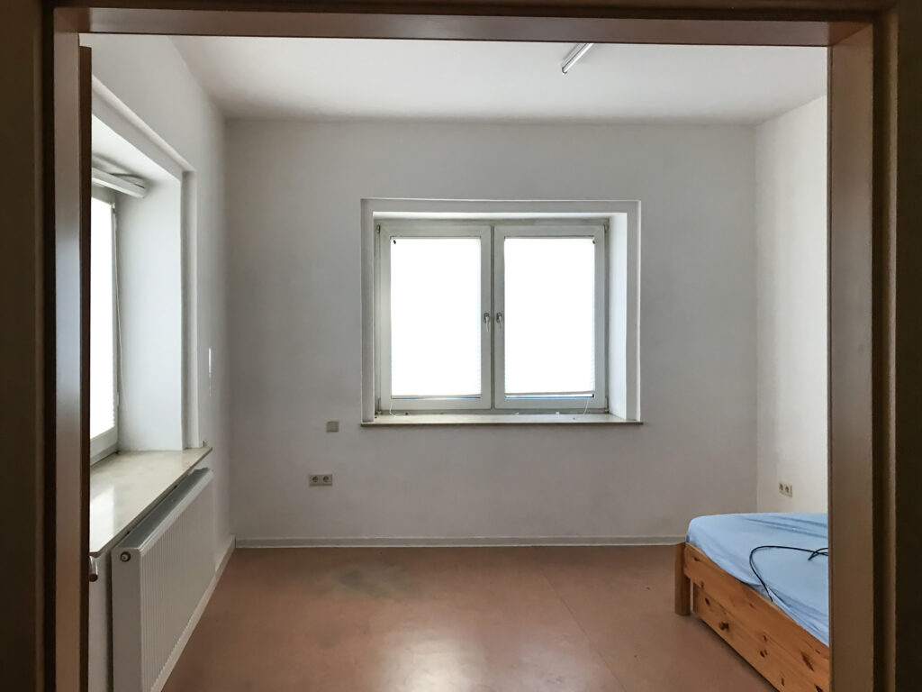 Übergangswohnung Zimmer mit Bett