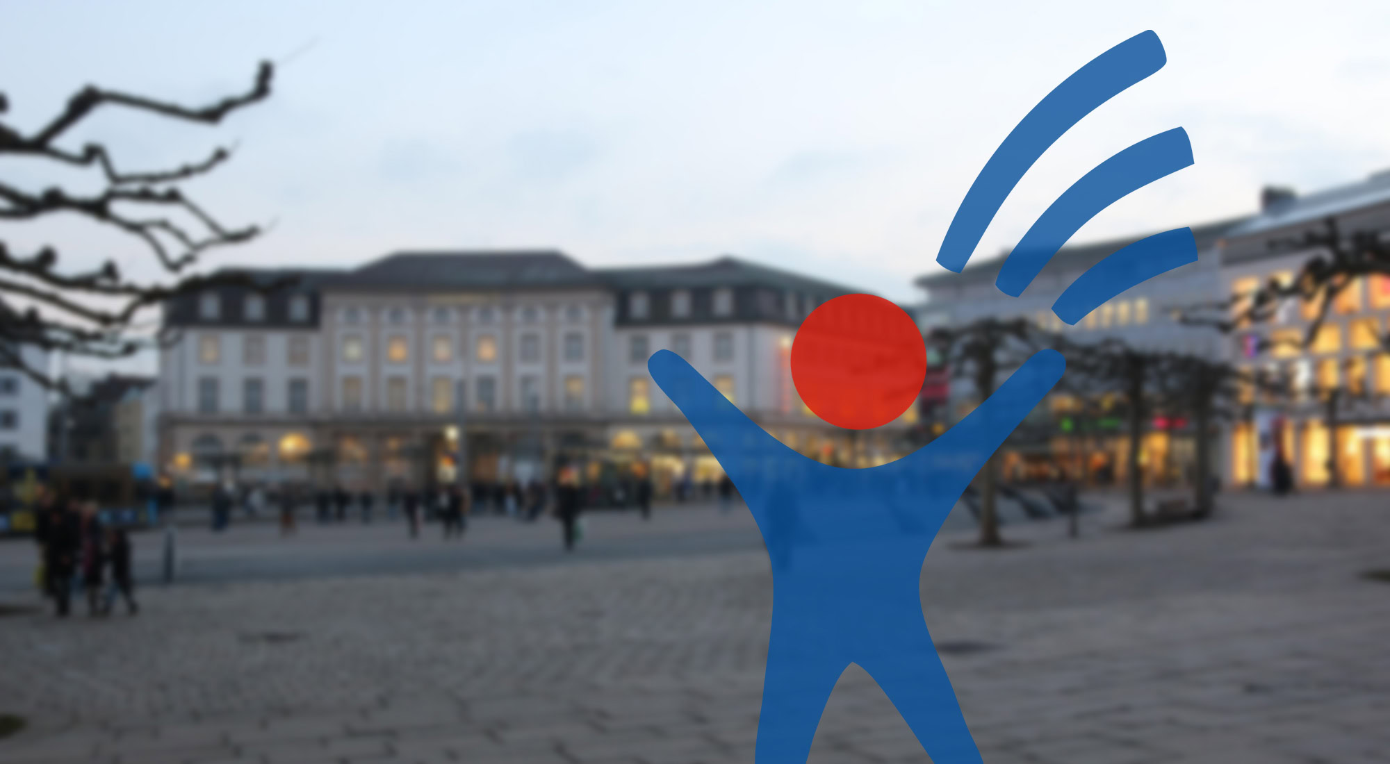 Logo Aktiv Teilhabe gestalten, im Hintergrund der Königsplatz Kassel